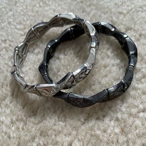 Lia sophia black and silver stretch bracelets.